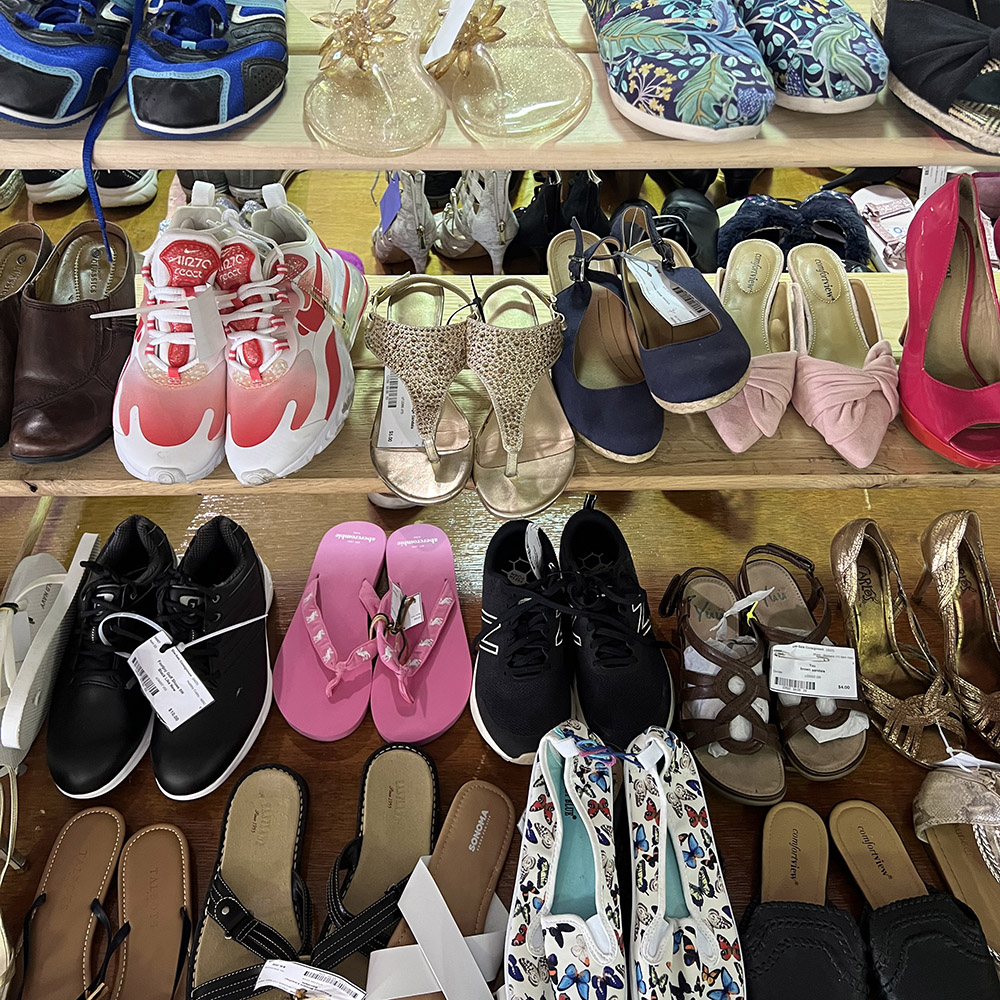 Shoes such as sneakers, heels, flats, and more for sale at She Sale Ladies Pop-Up Consignment Sale in Anne Arundel County, Maryland.